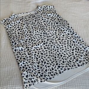 3/20$ Blue, Black and White Patterned Sleeveless Top